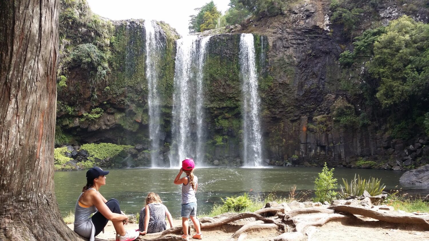 Family resting at Whangarei Falls 1500x844